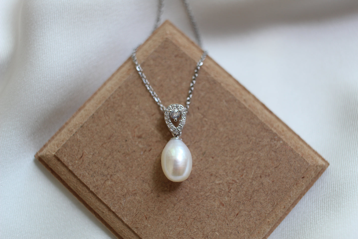 Pearl and cubic zirconia pendant necklace