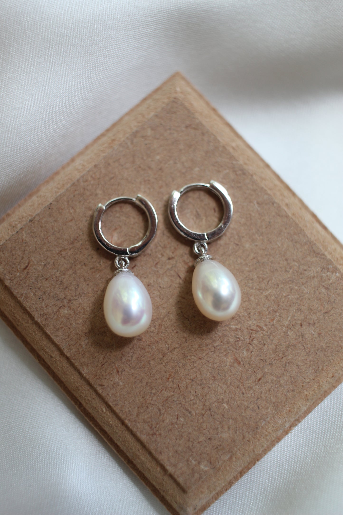 Silver pearl drop earrings