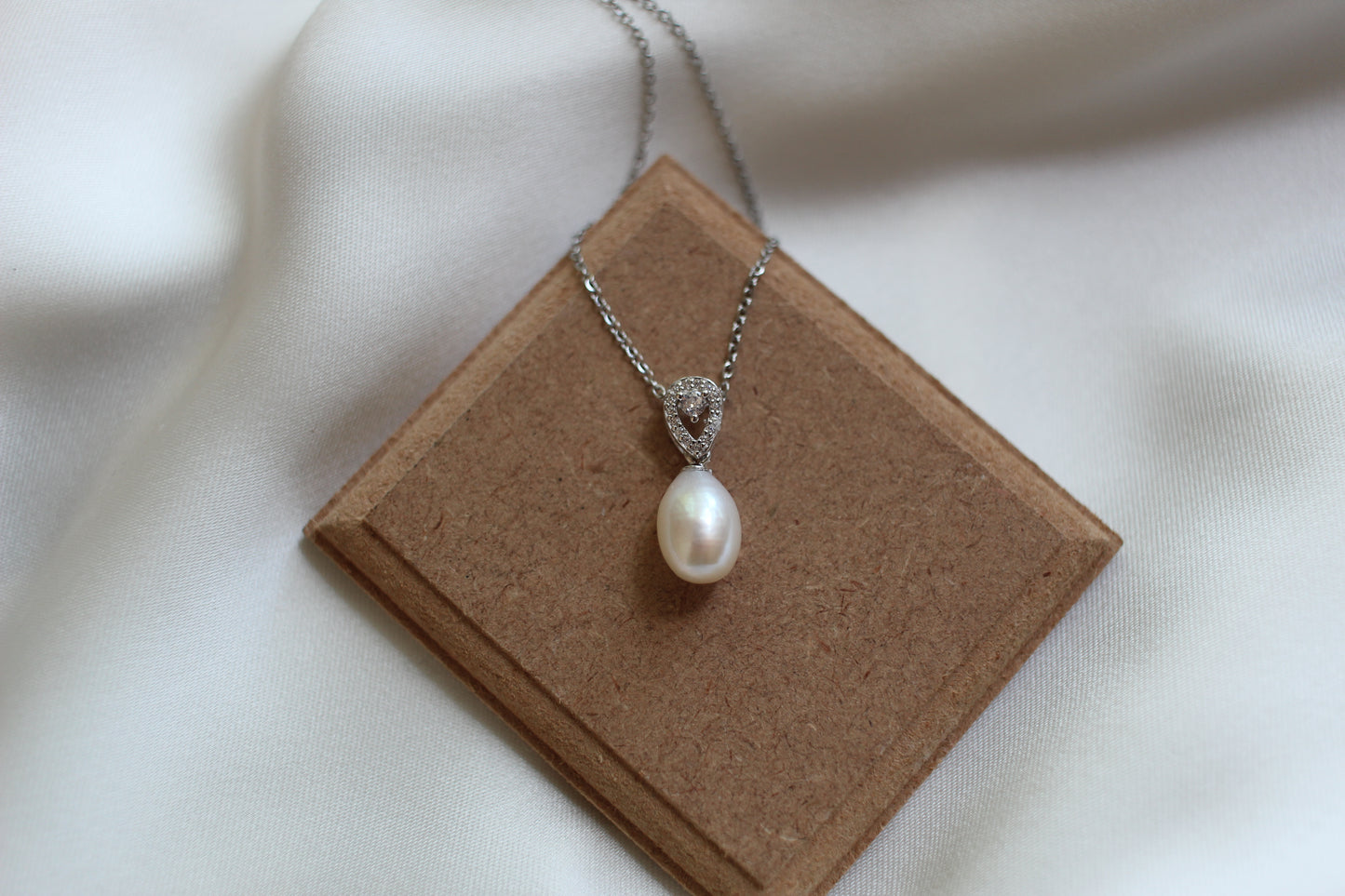 Pearl and cubic zirconia pendant necklace