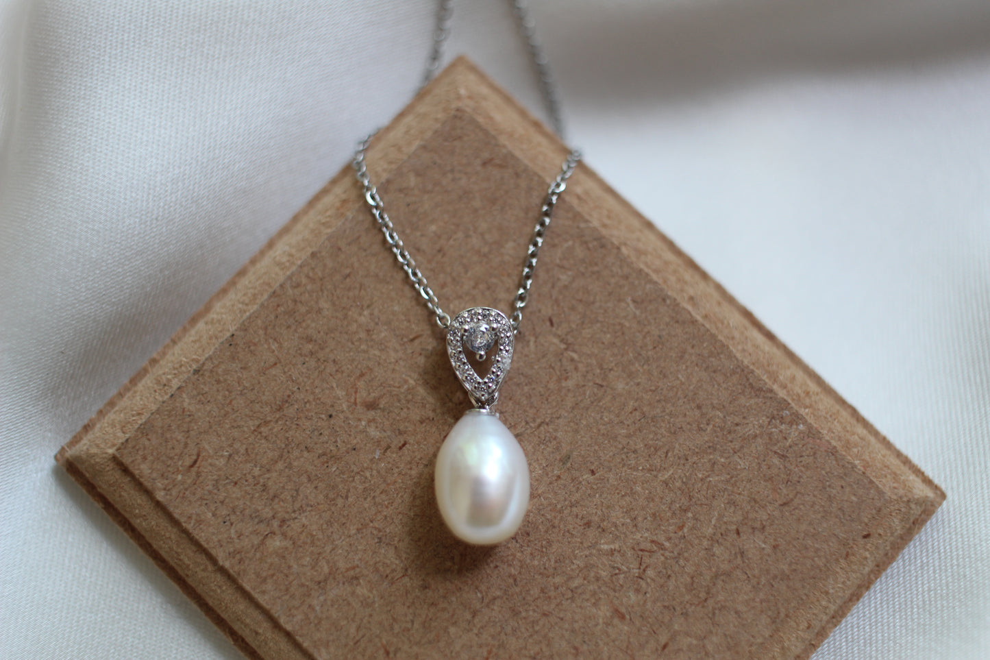 Pearl and cubic zirconia pendant necklace