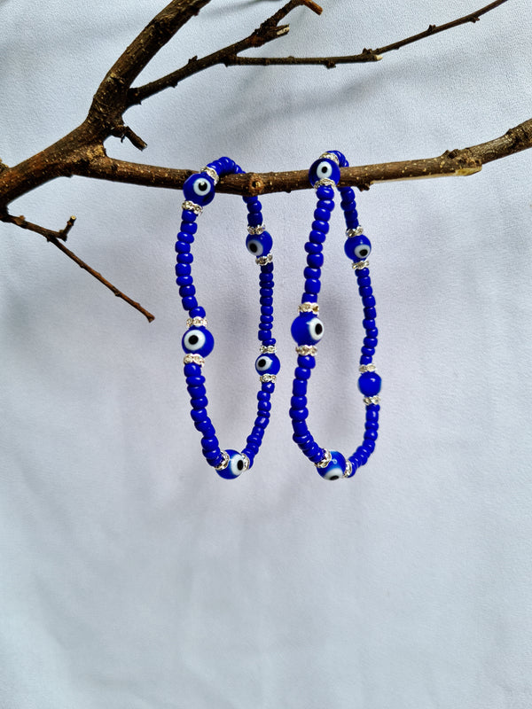 Diamond Evil Eye Bracelet 14 karat White Gold Beads, Blue Diamonds and